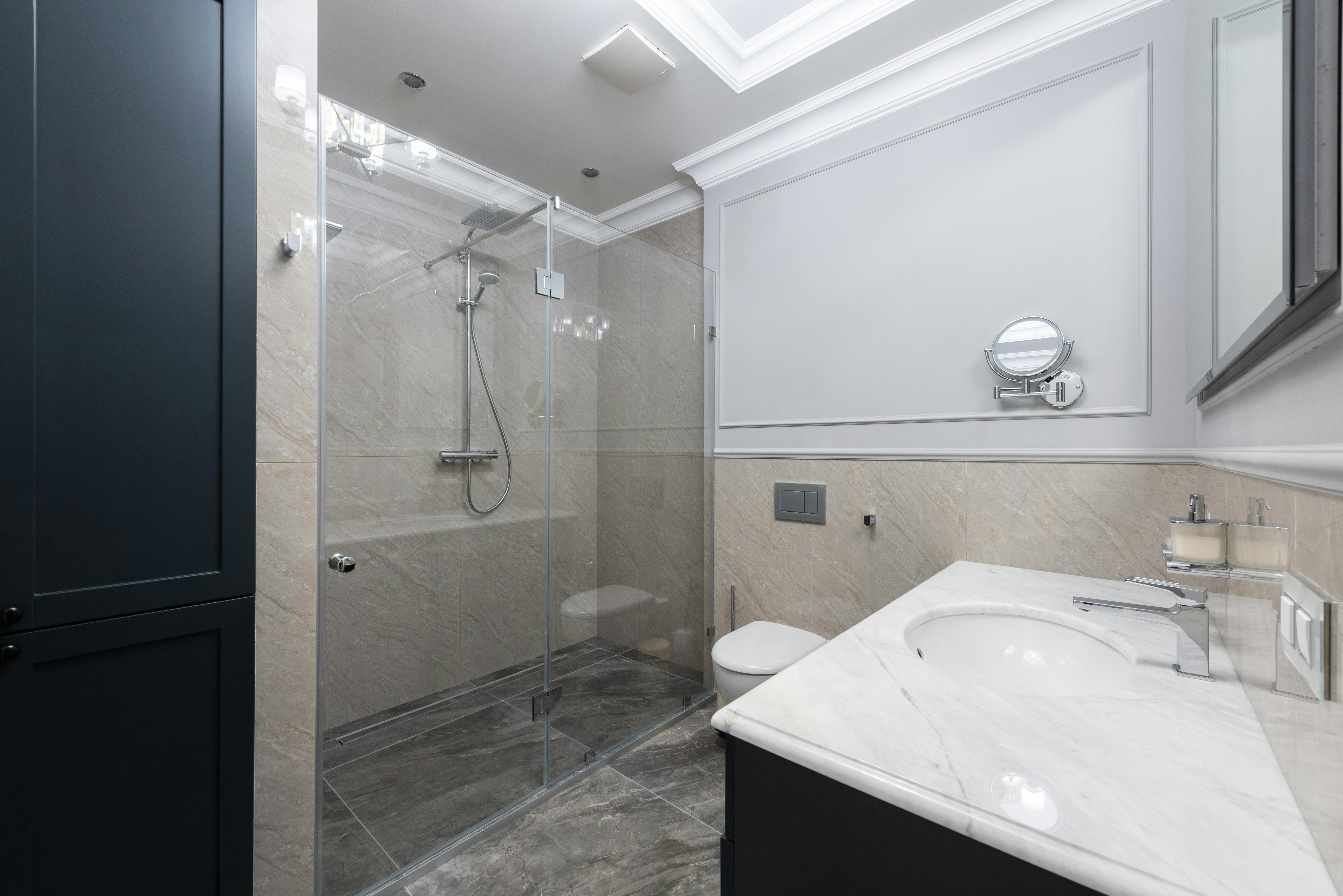 interior of modern bathroom with wide marble sink