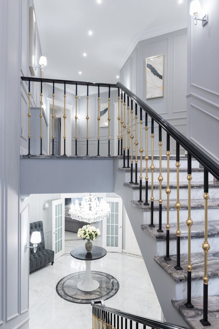 Metal Railing Of Marble Stairs In House