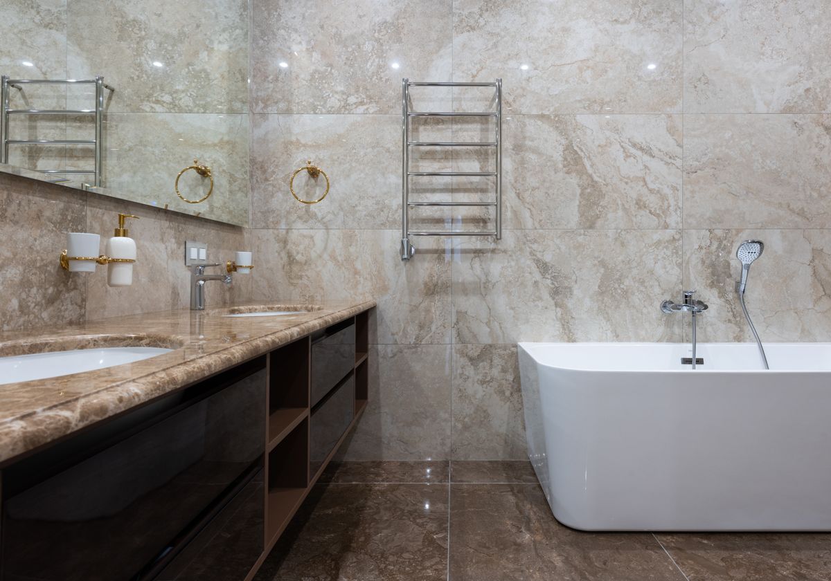 small shower niche with toiletries and wall storage