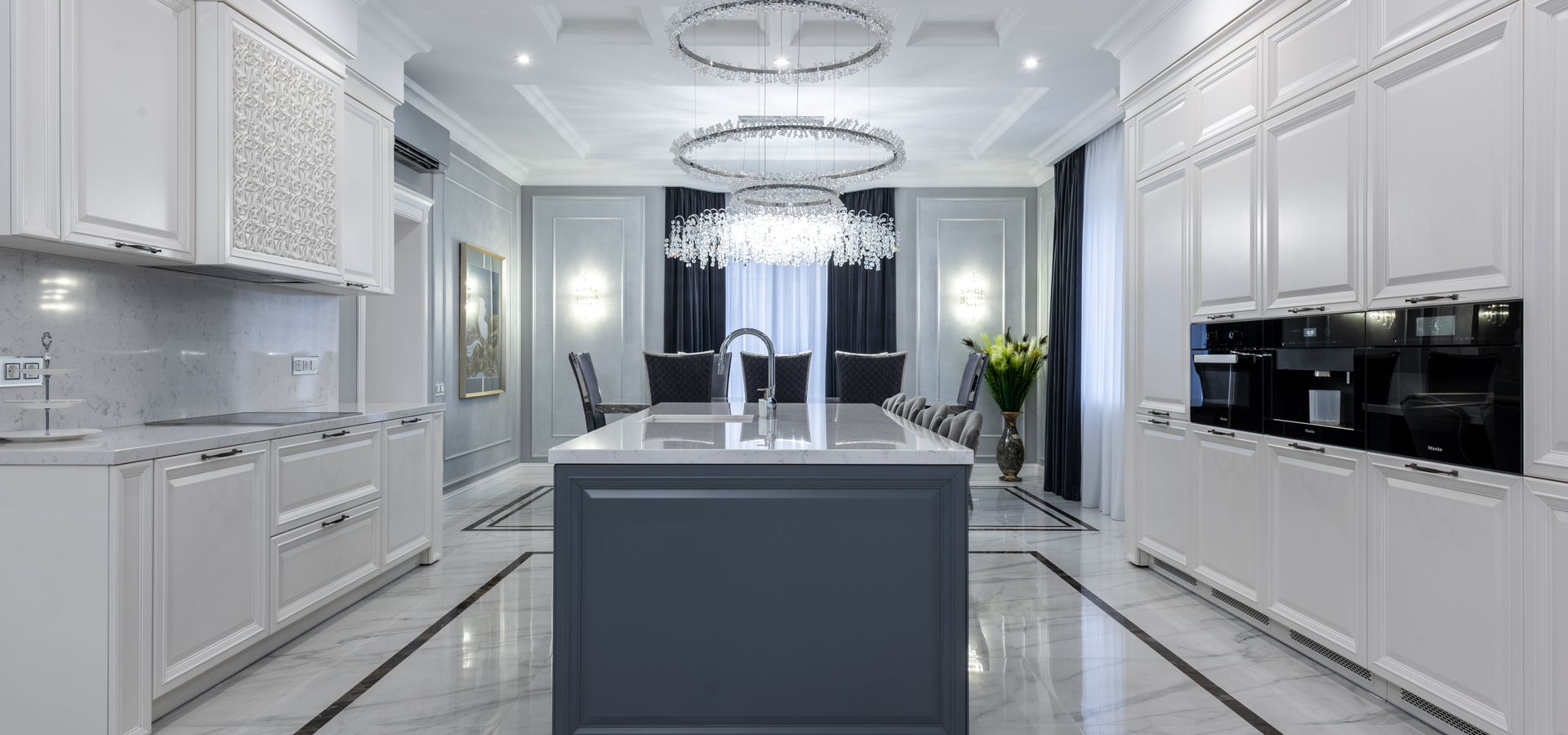 Spacious modern kitchen with light custom cabinetry