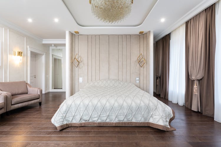 Luxury Bedroom With Queen Bed And Armchairs