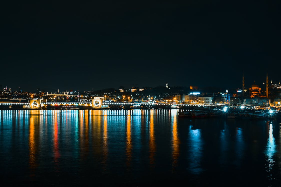 City Lights at Night Reflecting in a River