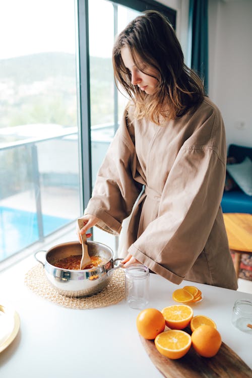 Free Woman Making Homemade Orange Jam  Stock Photo