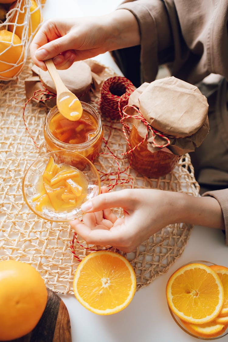 Person Making Homemade Jam