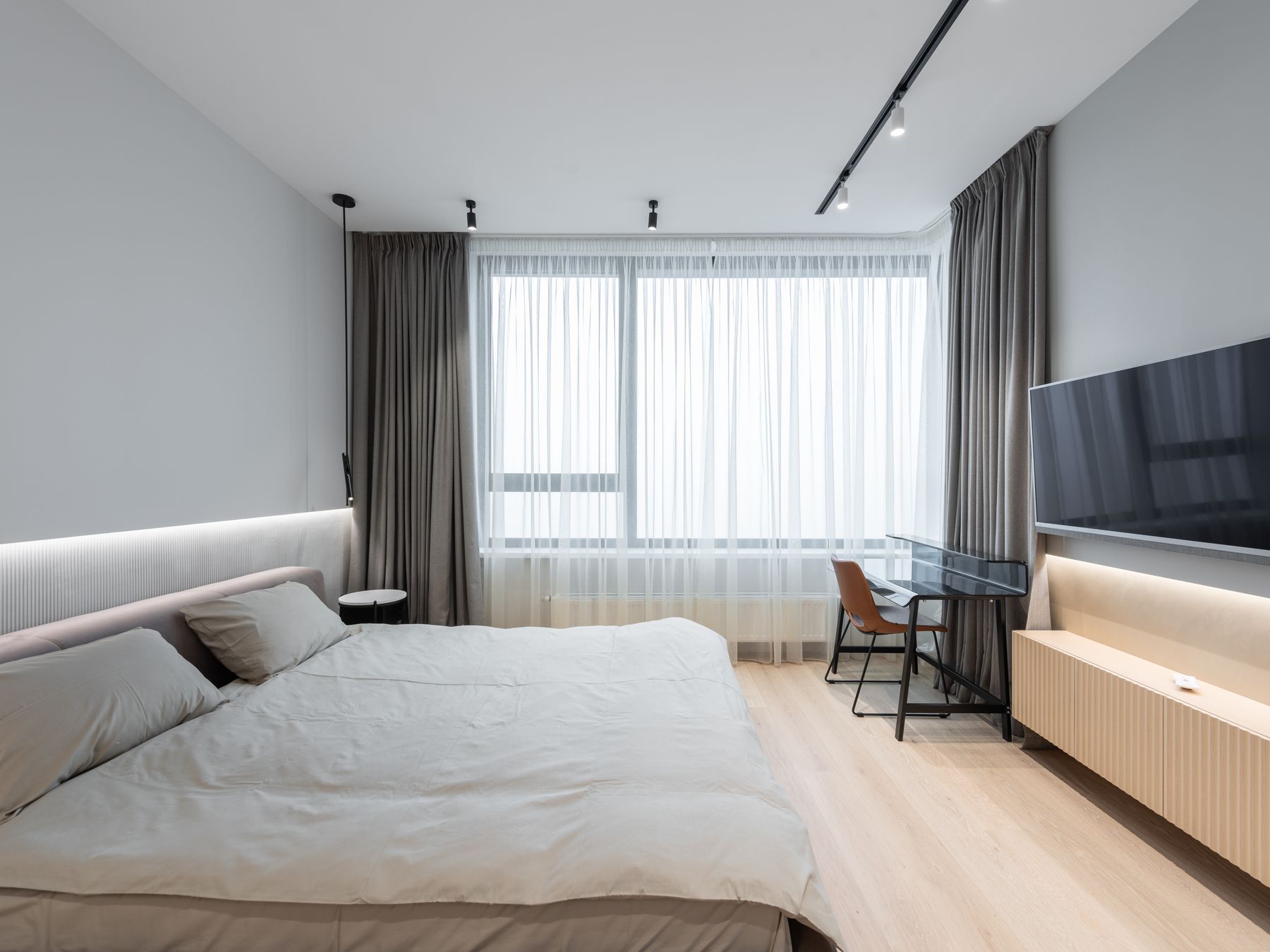 Woodford Wells — professional movers carrying furniture on a house move