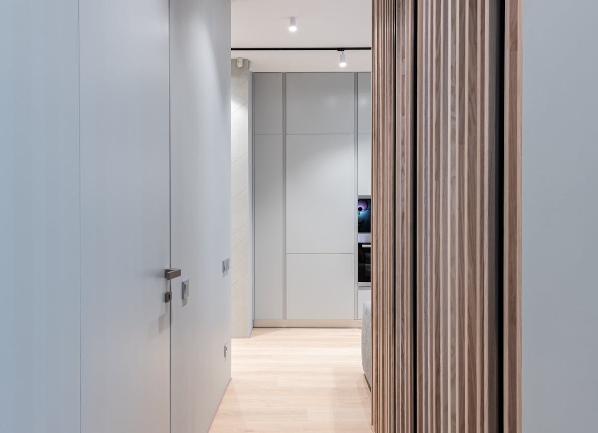 Serene modern farmhouse bedroom with layered bedding and neutral colors