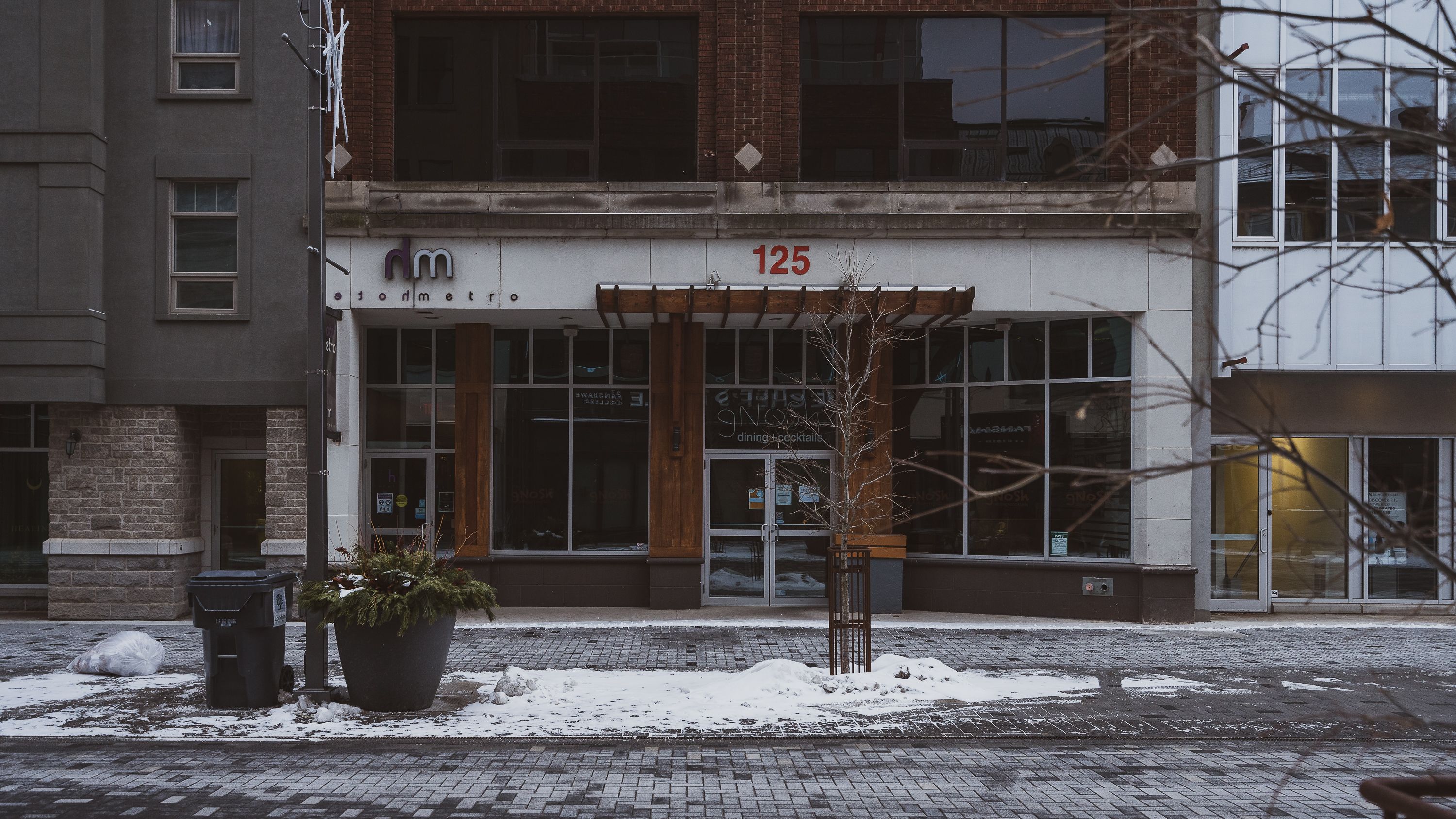 Captivating street view of a building facade in winter, London, Ontario.