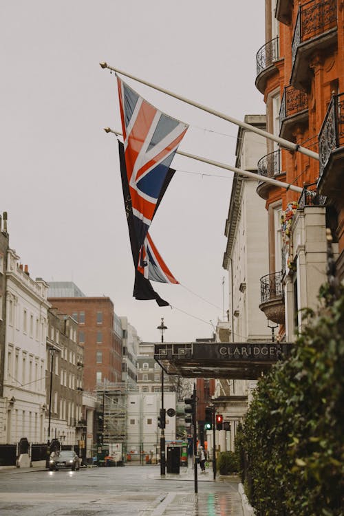 Photo of United Kingdom Flag Hanging on a Building 
