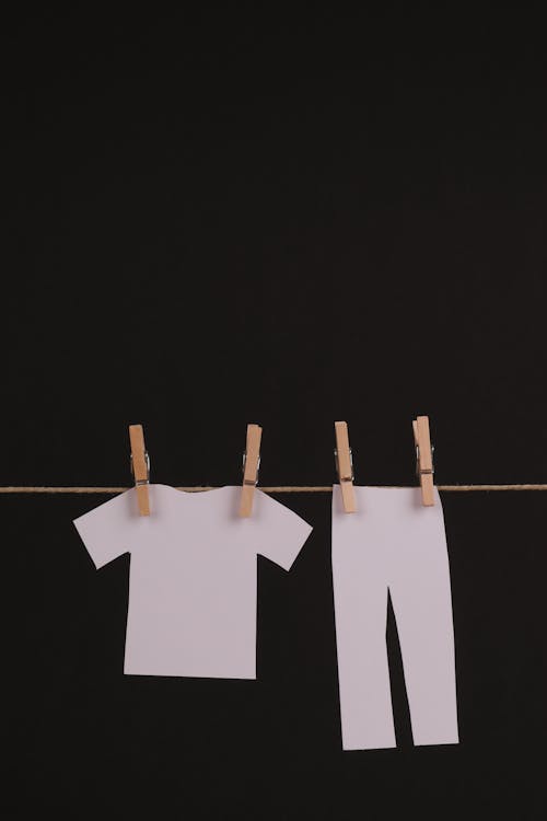 Free Paper Clothes Hanging on Rope Stock Photo