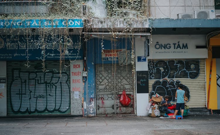 Street Vendors Talking On The Street