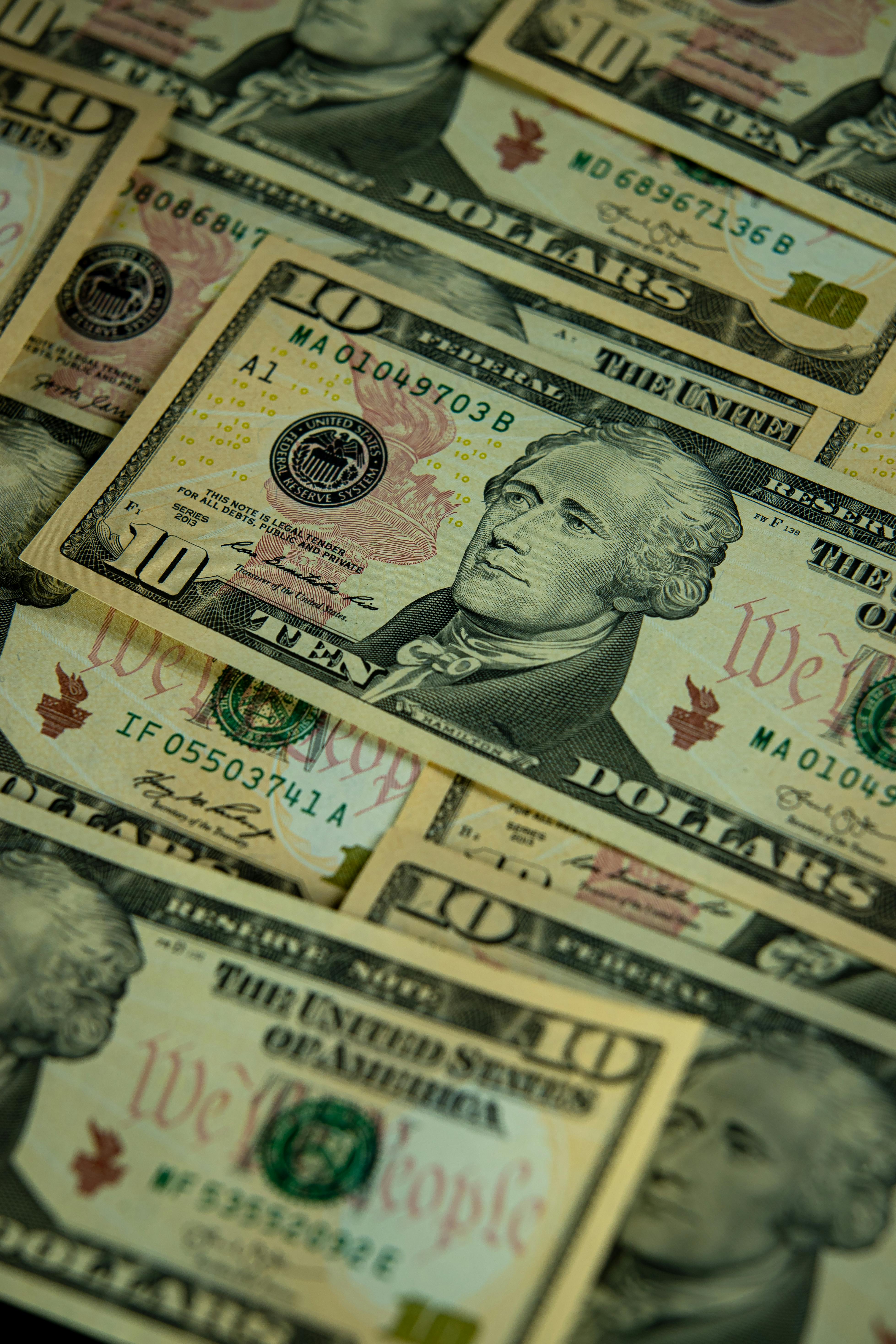 close up of dollar banknotes pile