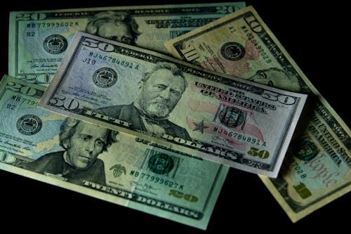 Foto profissional grátis de contas de papel, dinheiro, dólar