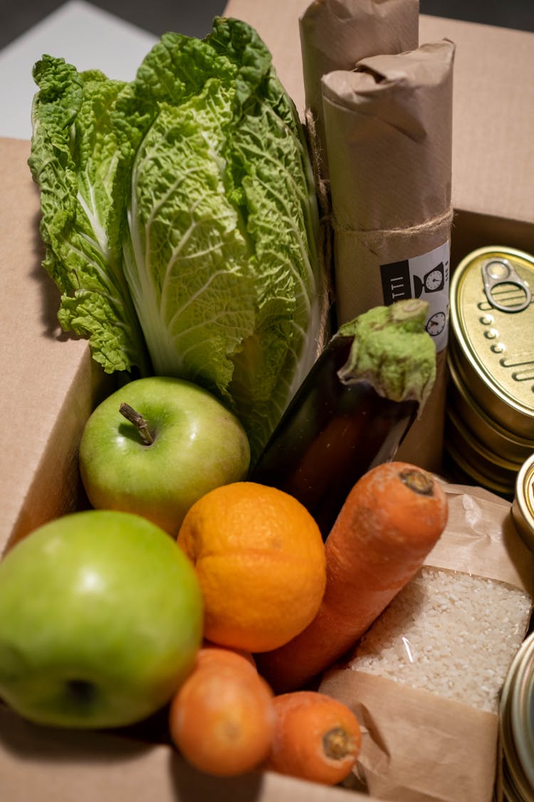 Fruits And Vegetables In The Carton Box