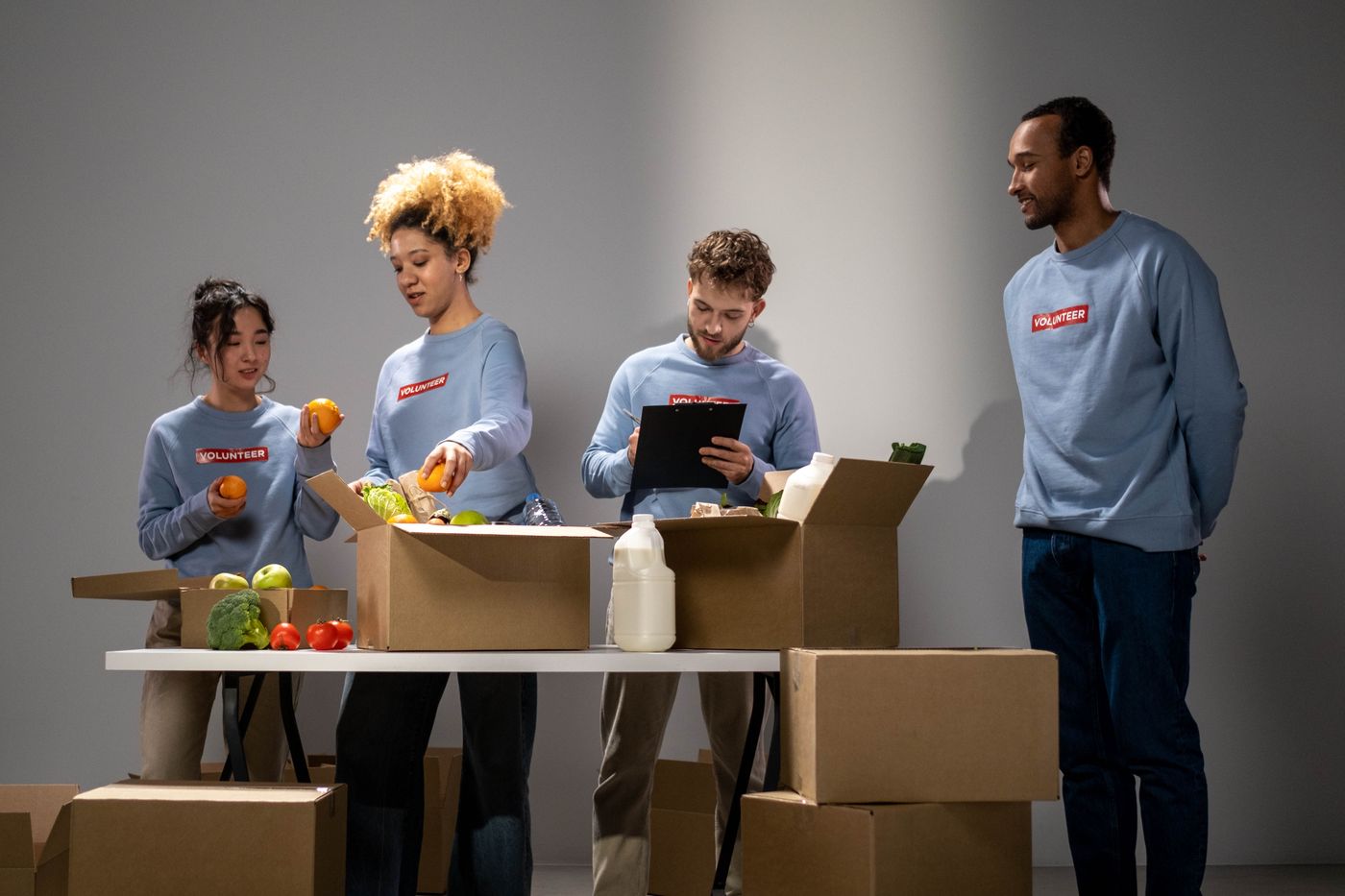 Volunteers packing food parcels for families