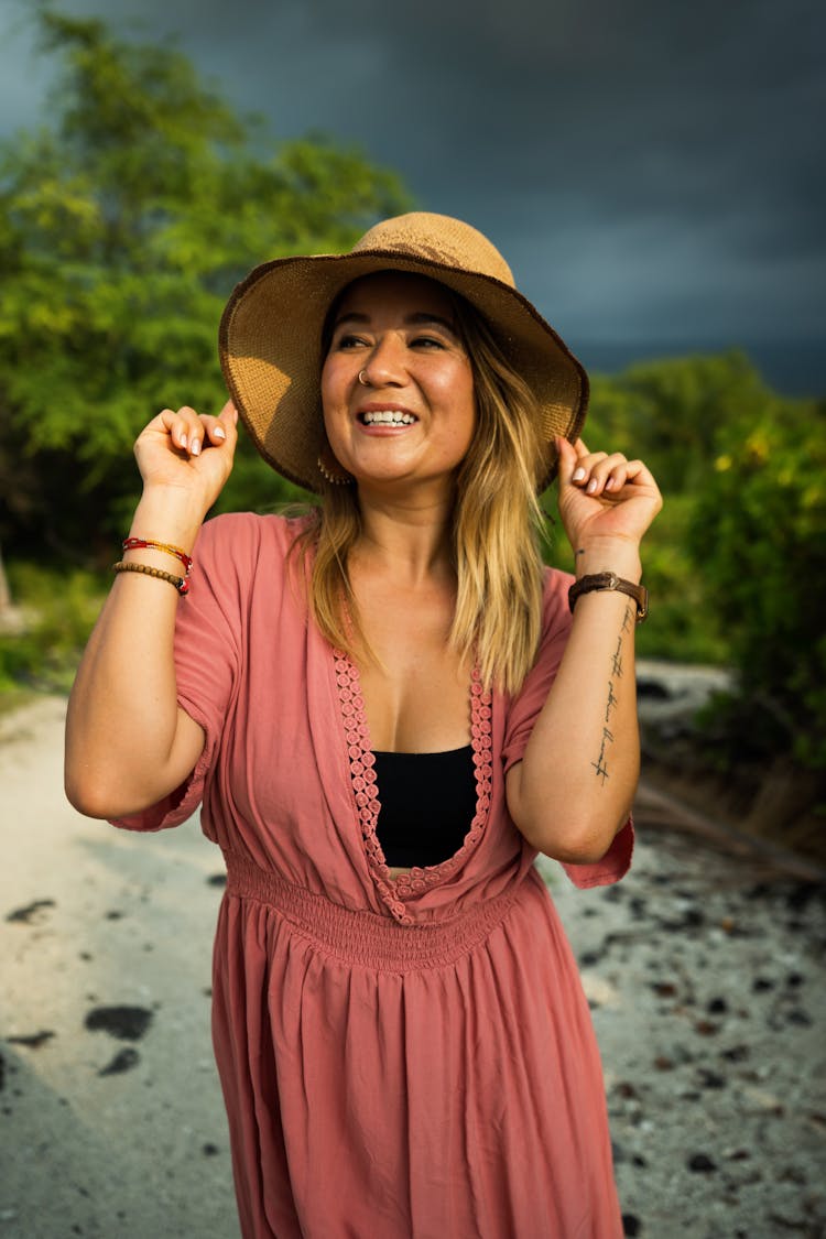 Cheerful Woman In Summer Cotton Dress And Hat