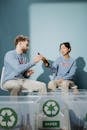 Man and Woman Sorting Garbage