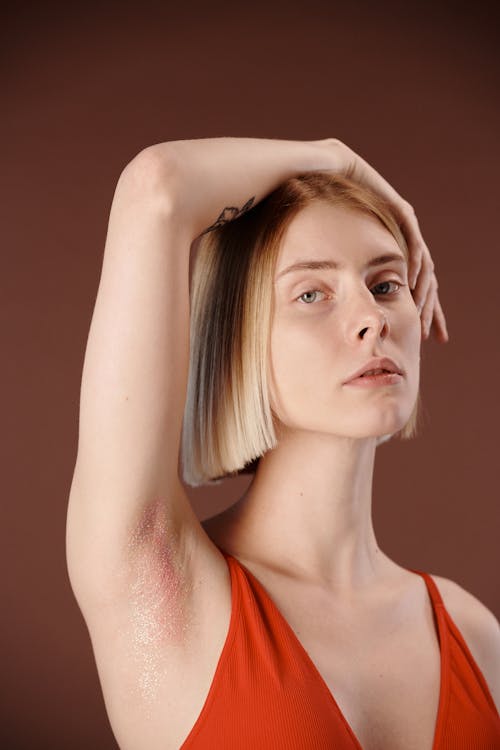 Woman Showing Her Underarm with Glitters