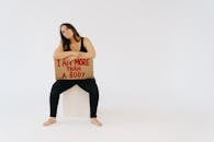 A Woman Showing a Placard