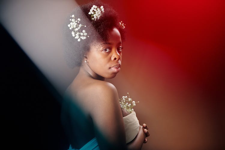 Woman In White Clothes With White Flowers On Hair