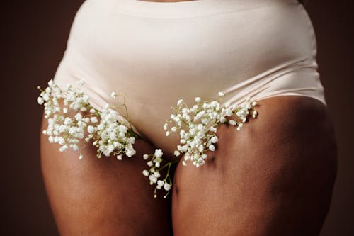 Free Woman in White Panty with Babys Breath Stock Photo