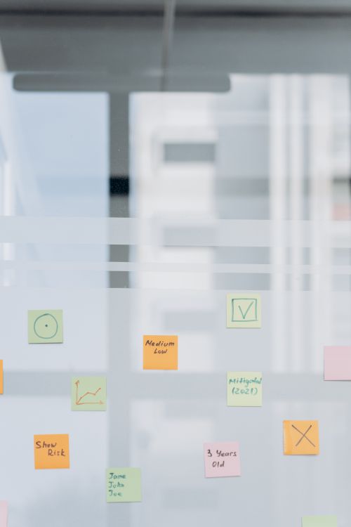 Sticky Notes on the Glass Panel · Free Stock Photo
