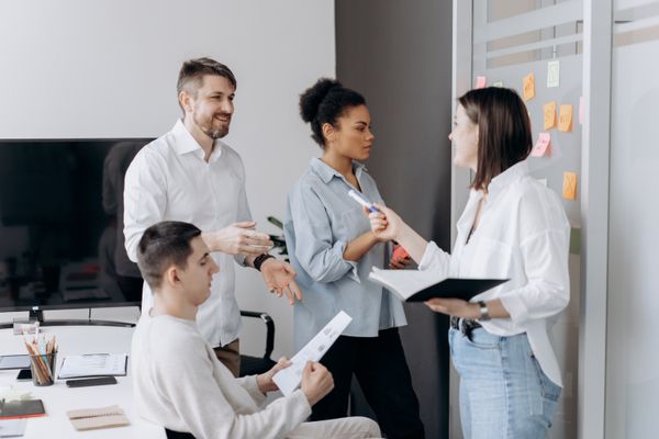 Small team planning with sticky notes