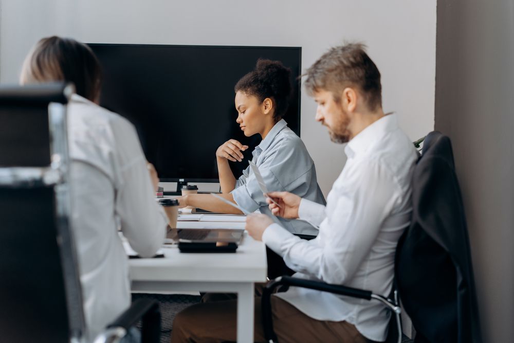 Business professionals attending a meeting