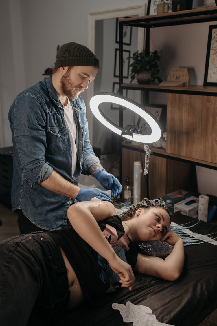 A Woman Getting A Tattoo 