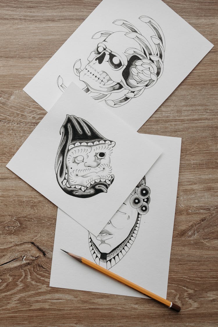 Tattoo Designs Next To A Pencil