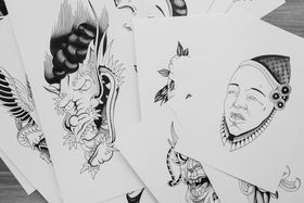 Illustrator sketching at a drawing table — Pavel Danilyuk on Pexels
