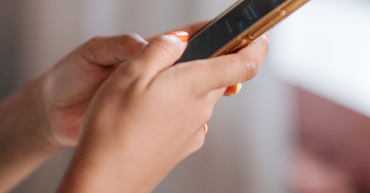 Close-up of Hands Using Phone · Free Stock Photo