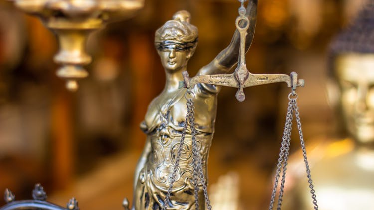 Close Up Of Justice Symbolic Figurine