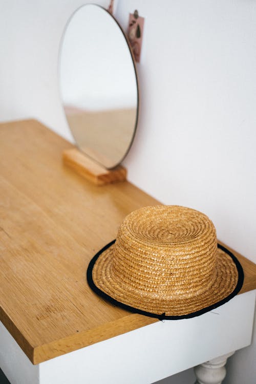 Hat and Mirror on Table