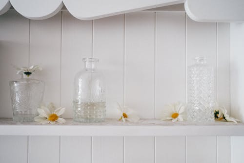 Glass Jars on white Shelf