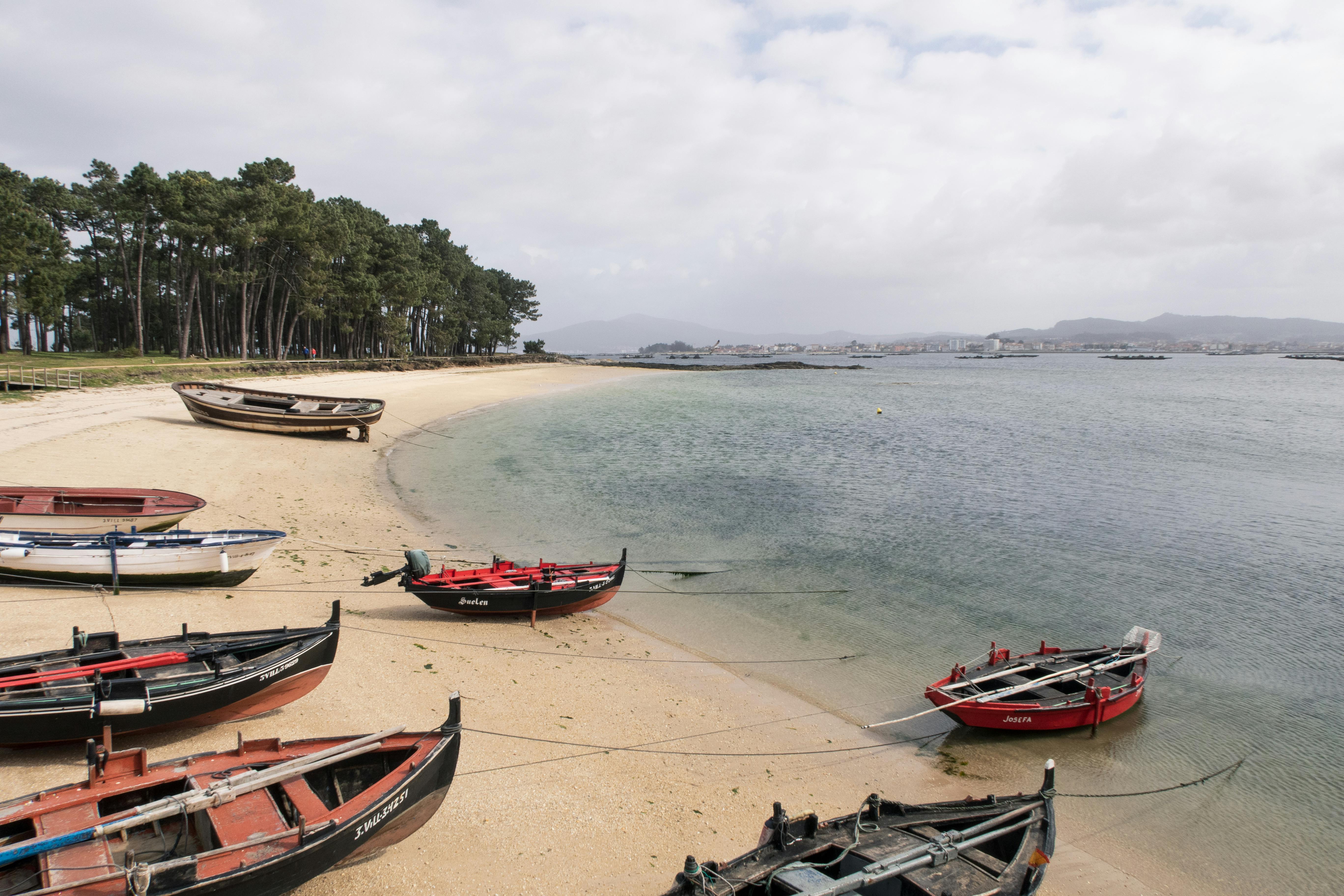 Red and Black Boat on Beach · Free Stock Photo