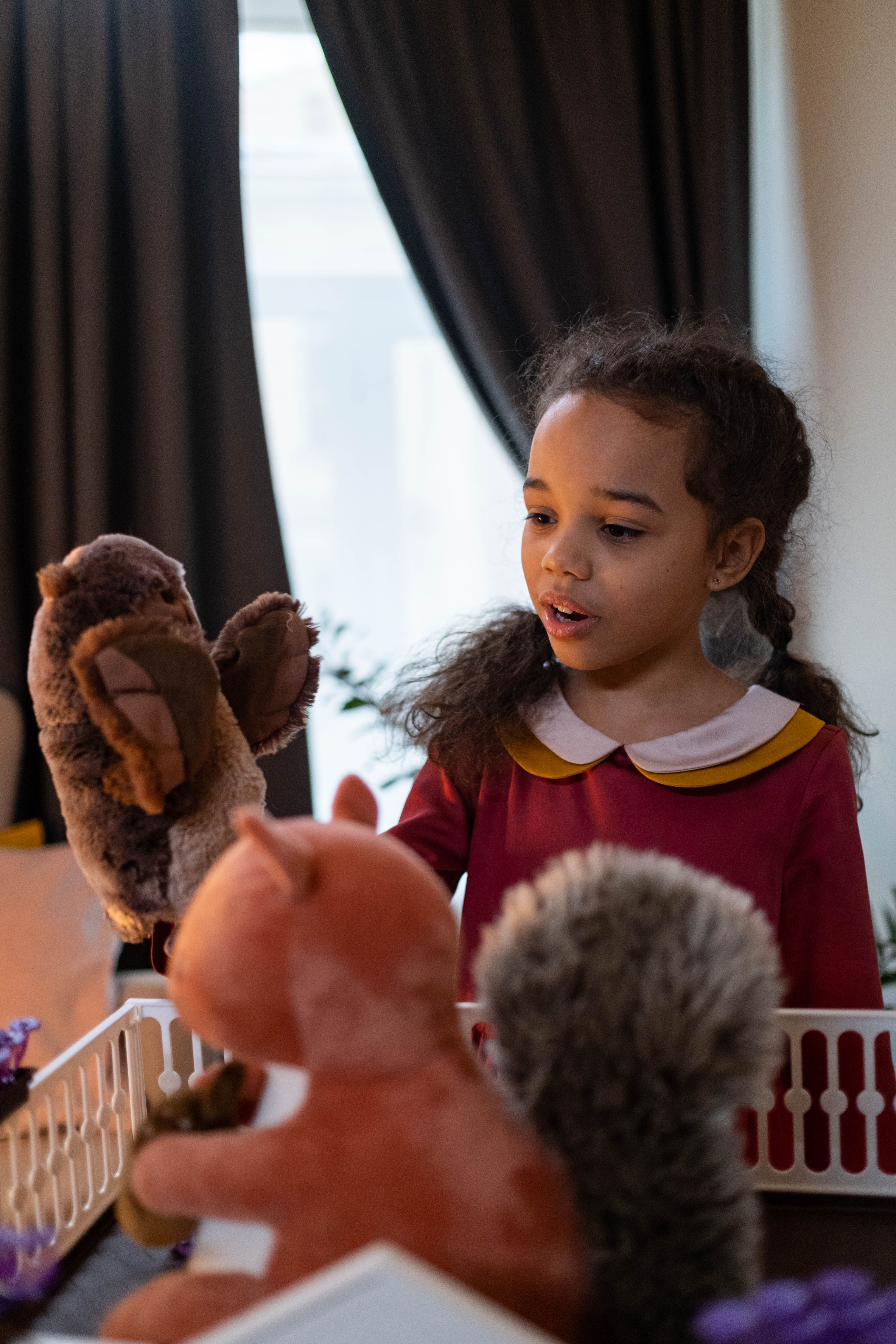 Girl Playing with her Toys · Free Stock Photo
