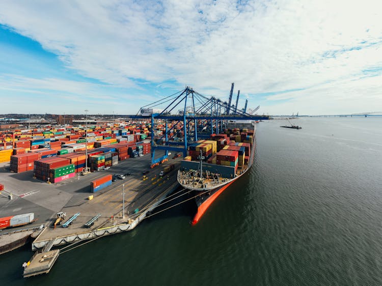 Cargo Ship At Unloading Containers