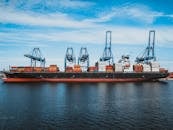 Cargo vessel moored in water of sea