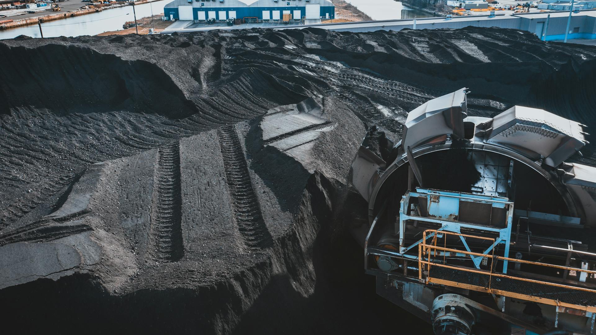 High angle view of coal processing facility with conveyor and machinery in Baltimore.