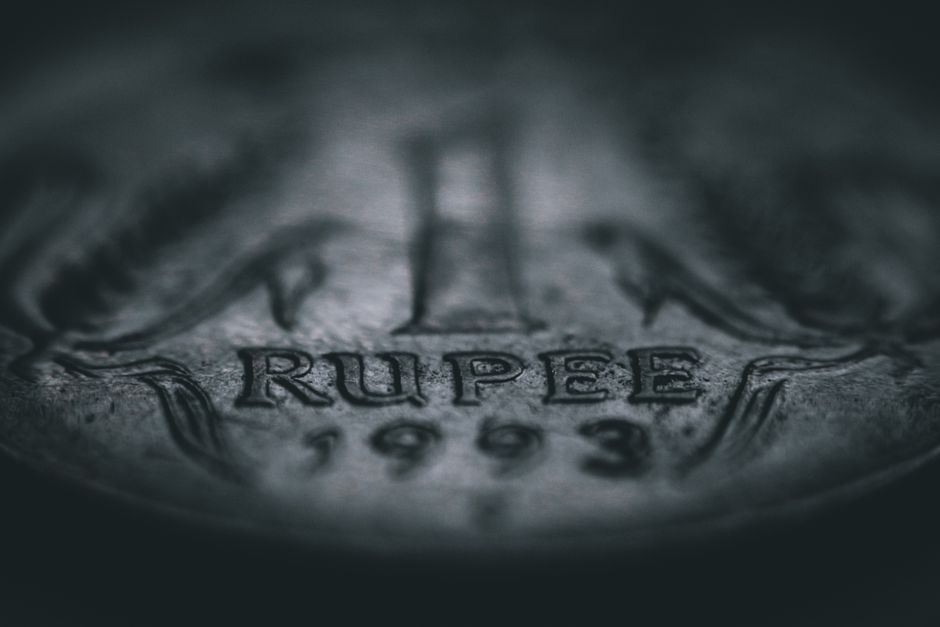 Sri Lankan Rupee banknotes and coins on a table