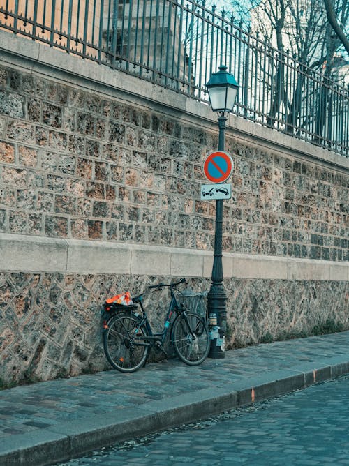 A Bicycle by a Lamppost