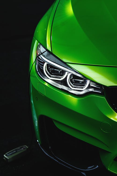 Gratis stockfoto met detailopname, glimmend, groene auto