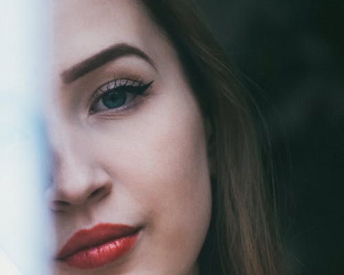 Woman in makeup looking at camera