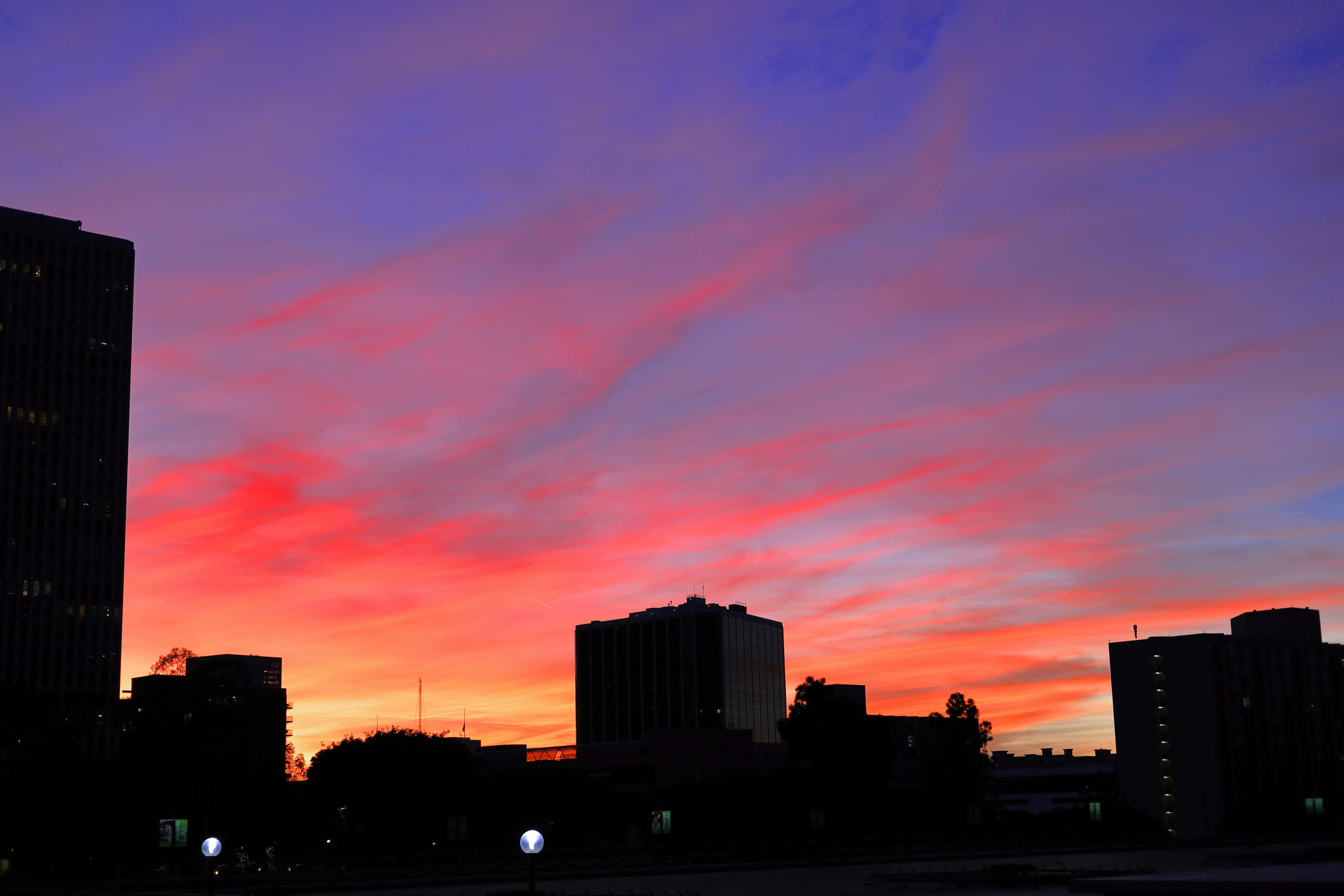 Close-up of a wheelchair wheel and child’s feet, symbolizing mobility aids