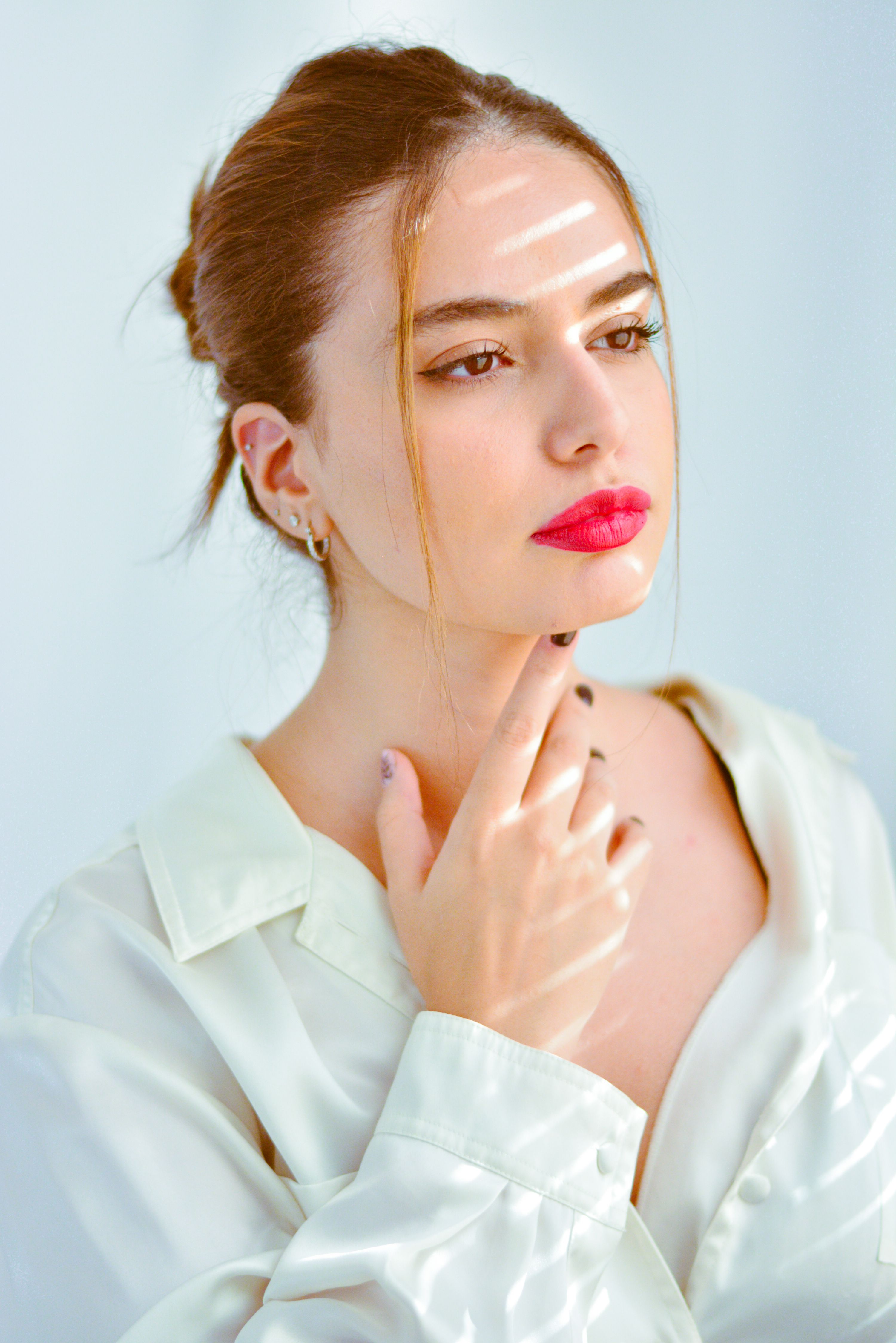 A Woman in White Long Sleeve Shirt · Free Stock Photo