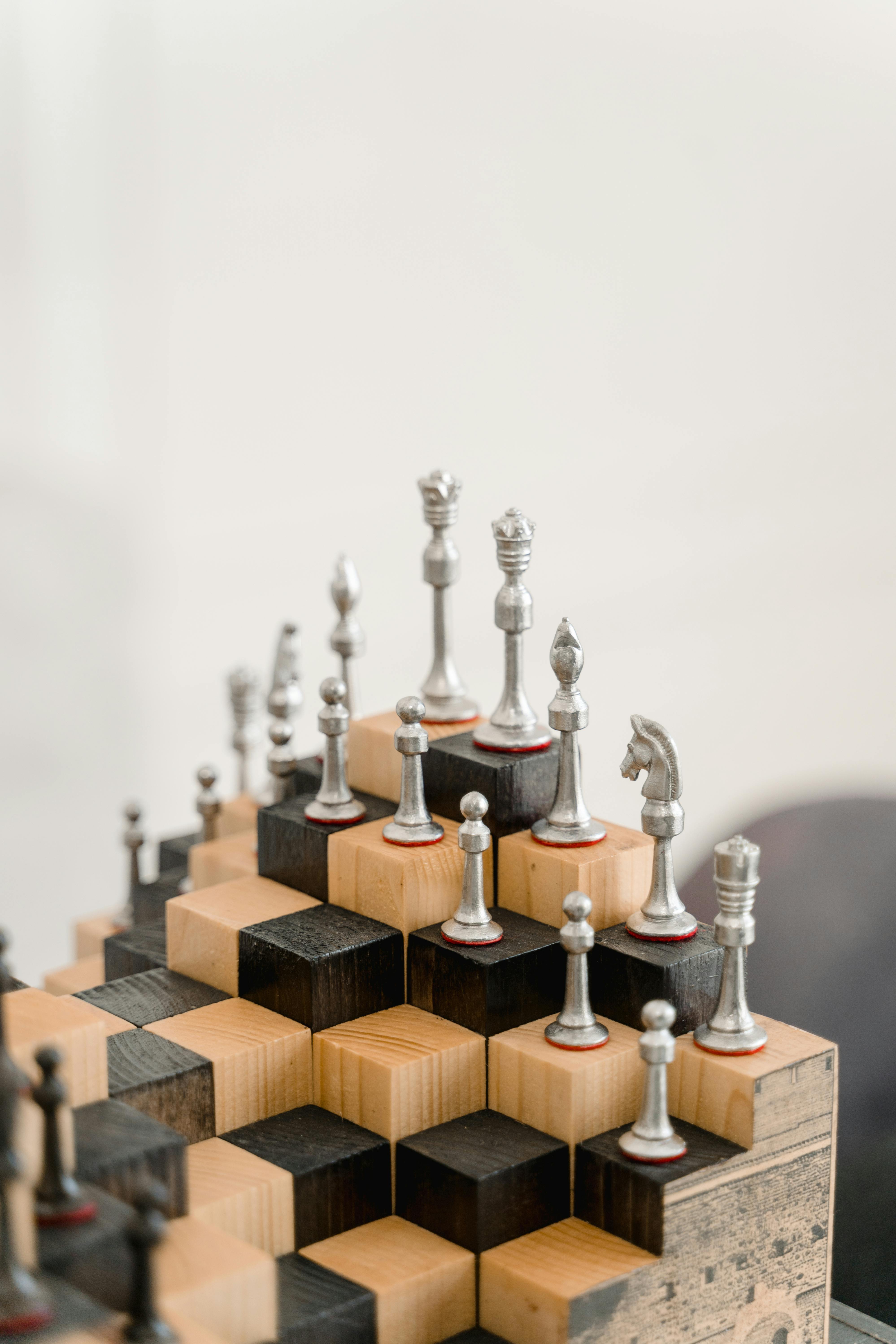 Premium Photo  Chess piece, compass and sand glass on board