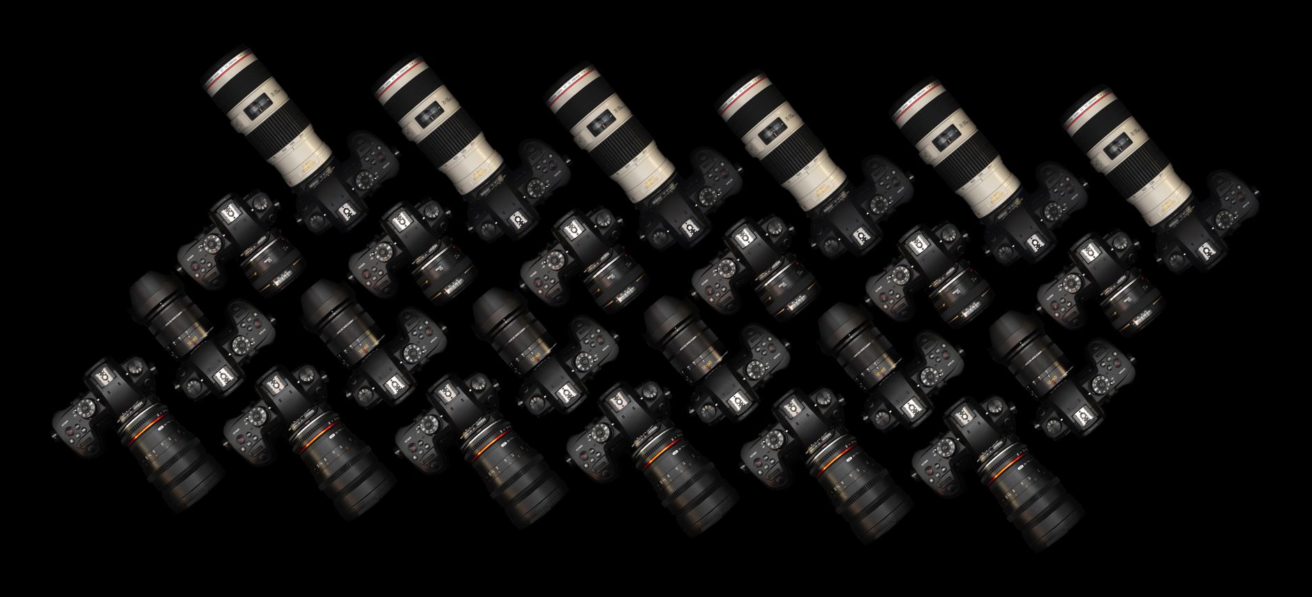 DSLR Cameras on a Black Surface