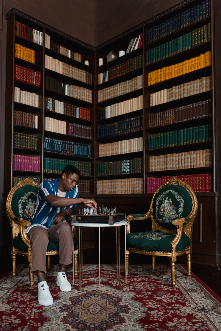 A Man Playing Chess Alone