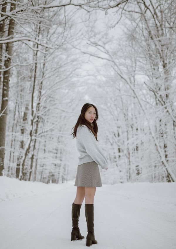 Woman in midi shirt dress and knee boots