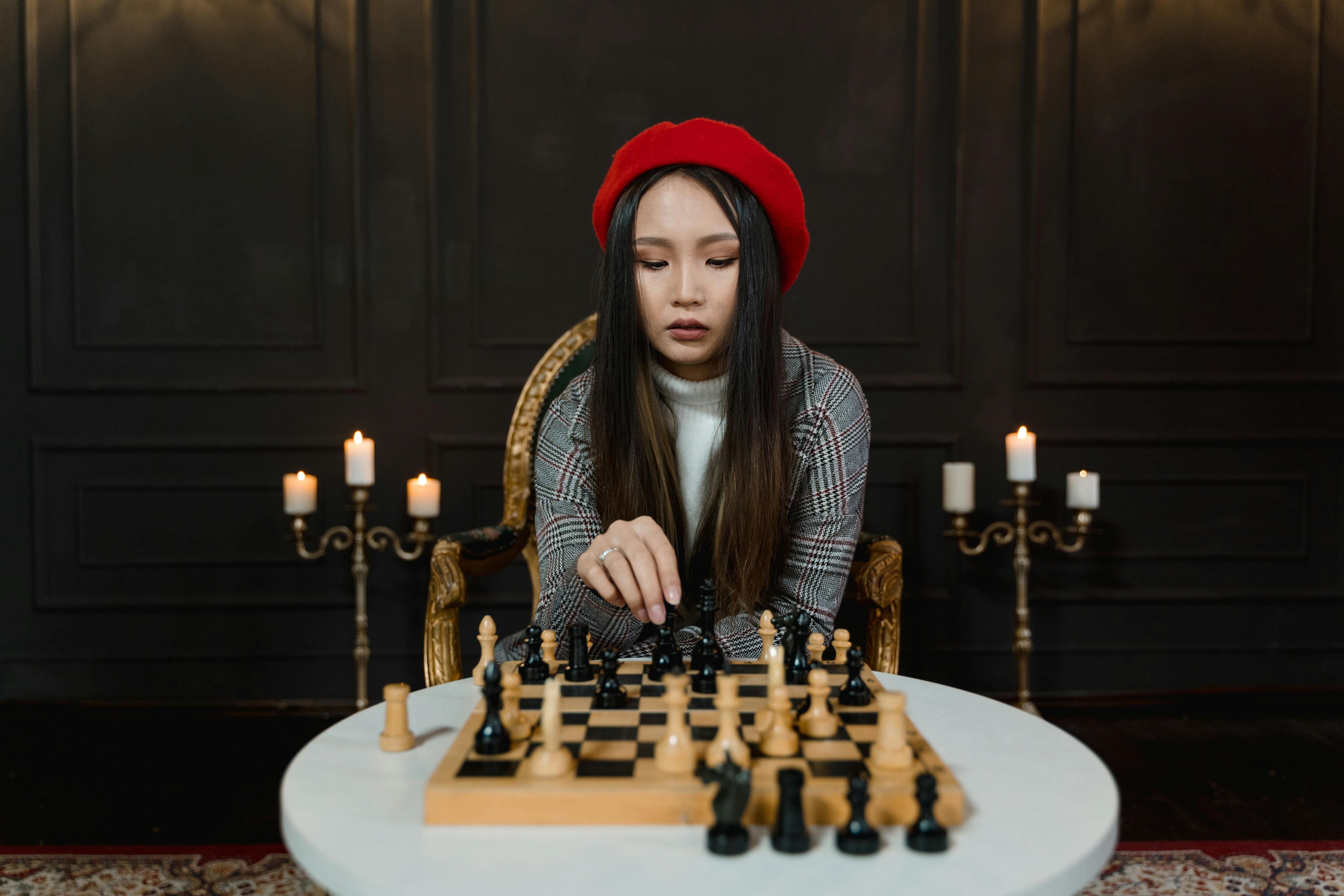 a woman playing chess